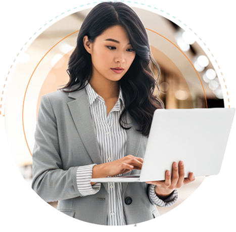 An outsourced content moderator working on a laptop