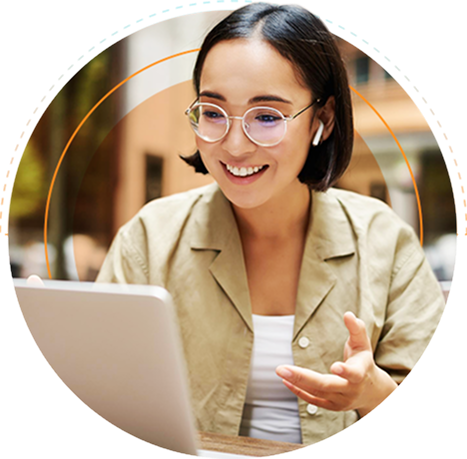 An outsourced digital marketing professional on a computer talking in a meeting